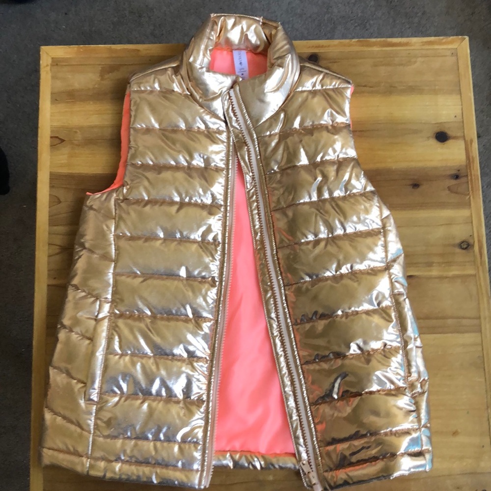Girls vest.  NEVER WORN!
